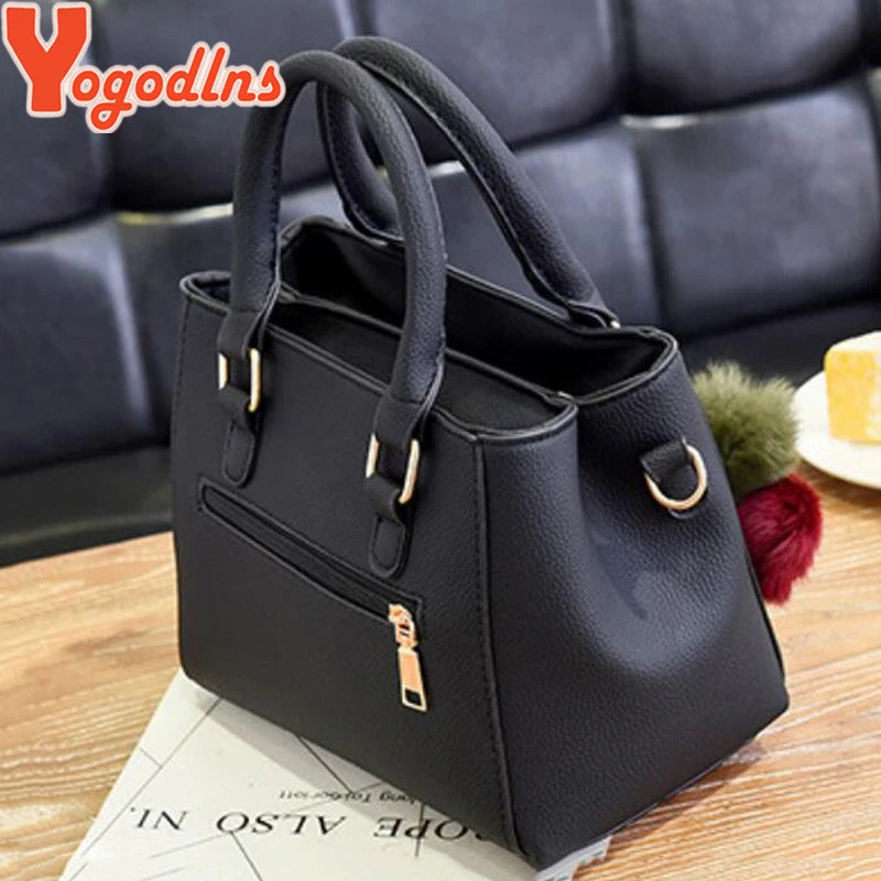 Structured Pebbled Leather Top-Handle Tote Bag with Pom-Pom Charm & Crossbody Strap