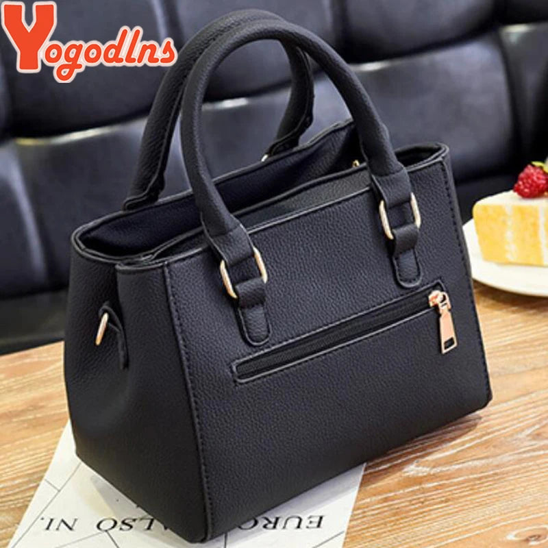 Structured Pebbled Leather Top-Handle Tote Bag with Pom-Pom Charm & Crossbody Strap