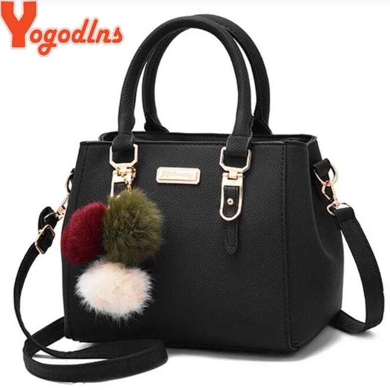 Structured Pebbled Leather Top-Handle Tote Bag with Pom-Pom Charm & Crossbody Strap