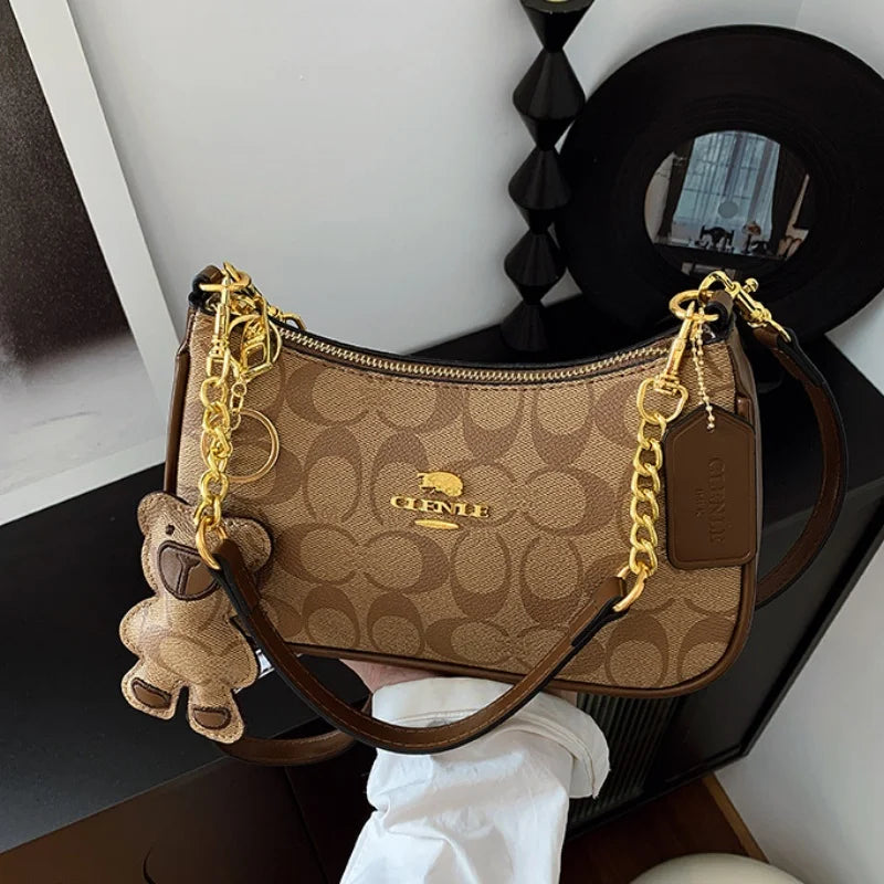 CLENLE Women's Vintage Monogram Shoulder Bag – Classic Canvas Crossbody Bag with Matching Bear Charm & Gold-Tone Chain