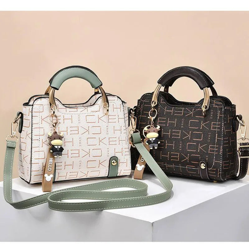 Women's PU Leather Handbag - Small Crossbody Purse with Cute Cow Charm & Multi-Pocket Interior - YSHKY
