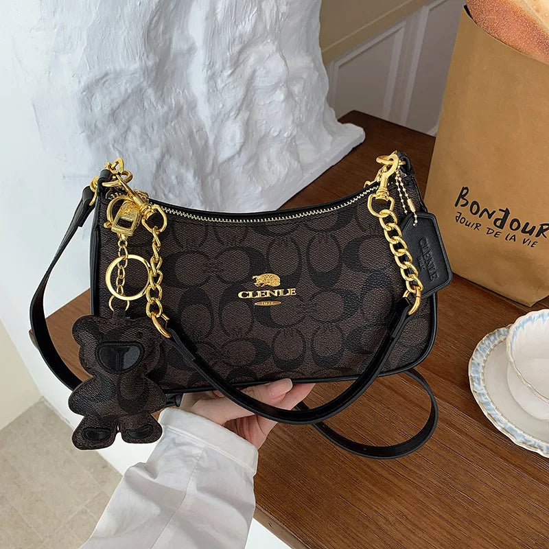 CLENLE Women's Vintage Monogram Shoulder Bag – Classic Canvas Crossbody Bag with Matching Bear Charm & Gold-Tone Chain