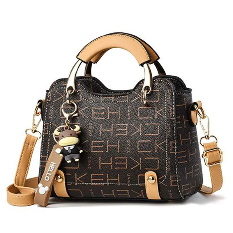 Women's PU Leather Handbag - Small Crossbody Purse with Cute Cow Charm & Multi-Pocket Interior - YSHKY