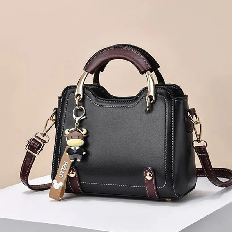 Women's PU Leather Handbag - Small Crossbody Purse with Cute Cow Charm & Multi-Pocket Interior - YSHKY