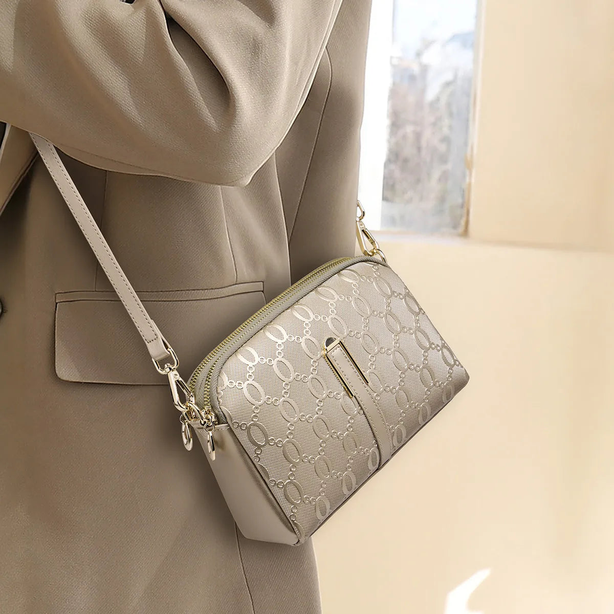 FOXER Women's Monogram Embossed Crossbody Bag – Luxury Double-Zipper Shoulder Camera Bag